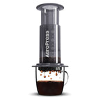 AeroPress Original Coffee Press: Manual Single Serve Coffee Maker, 8 oz Capacity, Includes Scoop & Paper Filters, Black